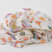 single swaddle blanket with ice cream cones, banana splits, and other frozen treats