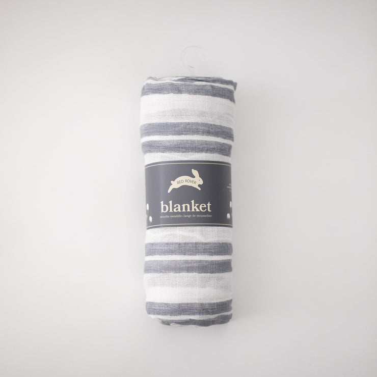 single swaddle blanket with double grey stripes on a white background rolled in Red Rove packaging