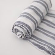 single swaddle blanket with double grey stripes on a white background