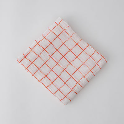 single swaddle blanket with orange crossed stripes 