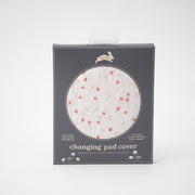 cotton muslin changing pad cover with pink cherry blossom petals on a white background in Red Rover packaging