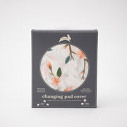 cotton muslin changing pad cover with pink peach blossoms blooming on a branch with leaves in Red Rover packaging
